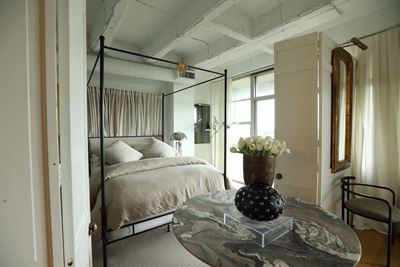 Bedroom with large windows and natural lighting